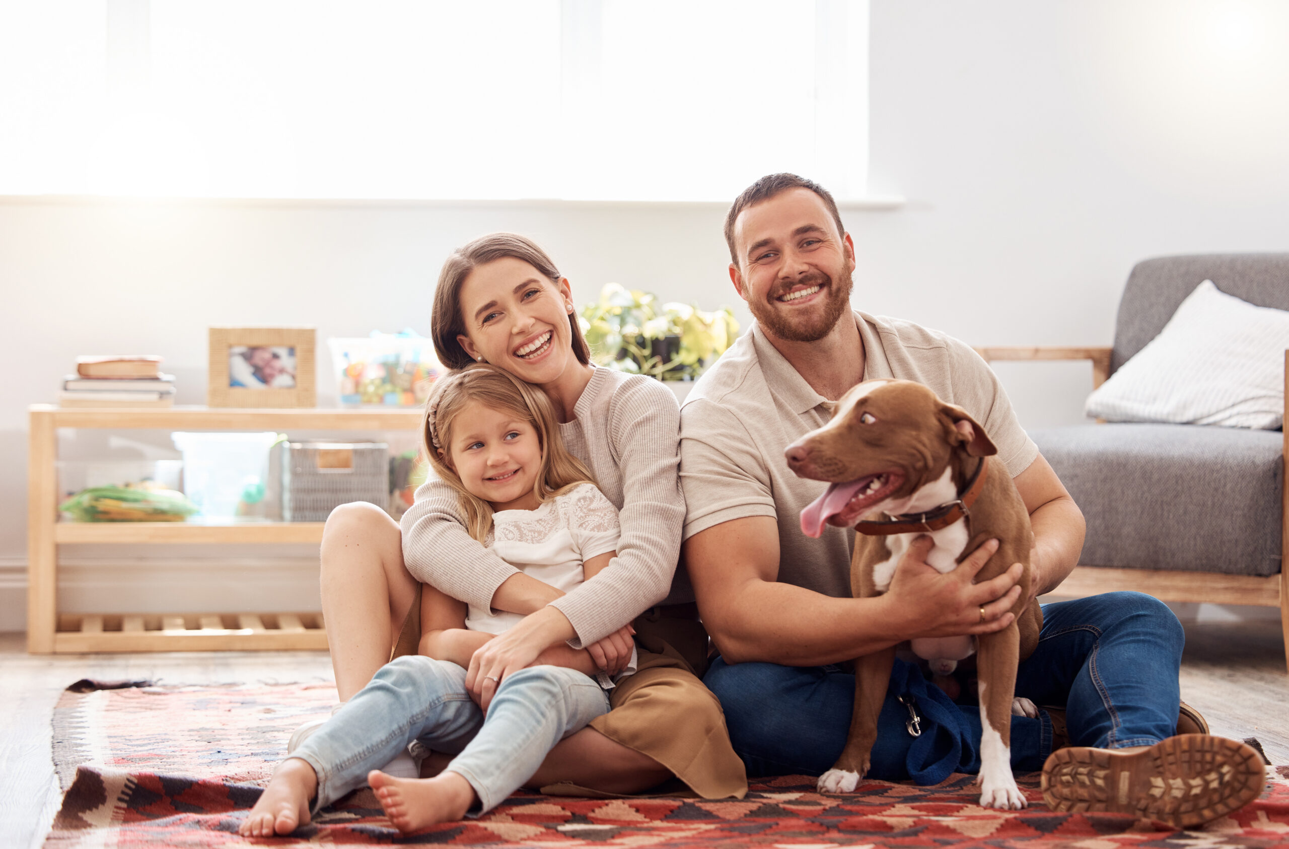 St. George family with their pet, protected by Best Overalls pest and weed control