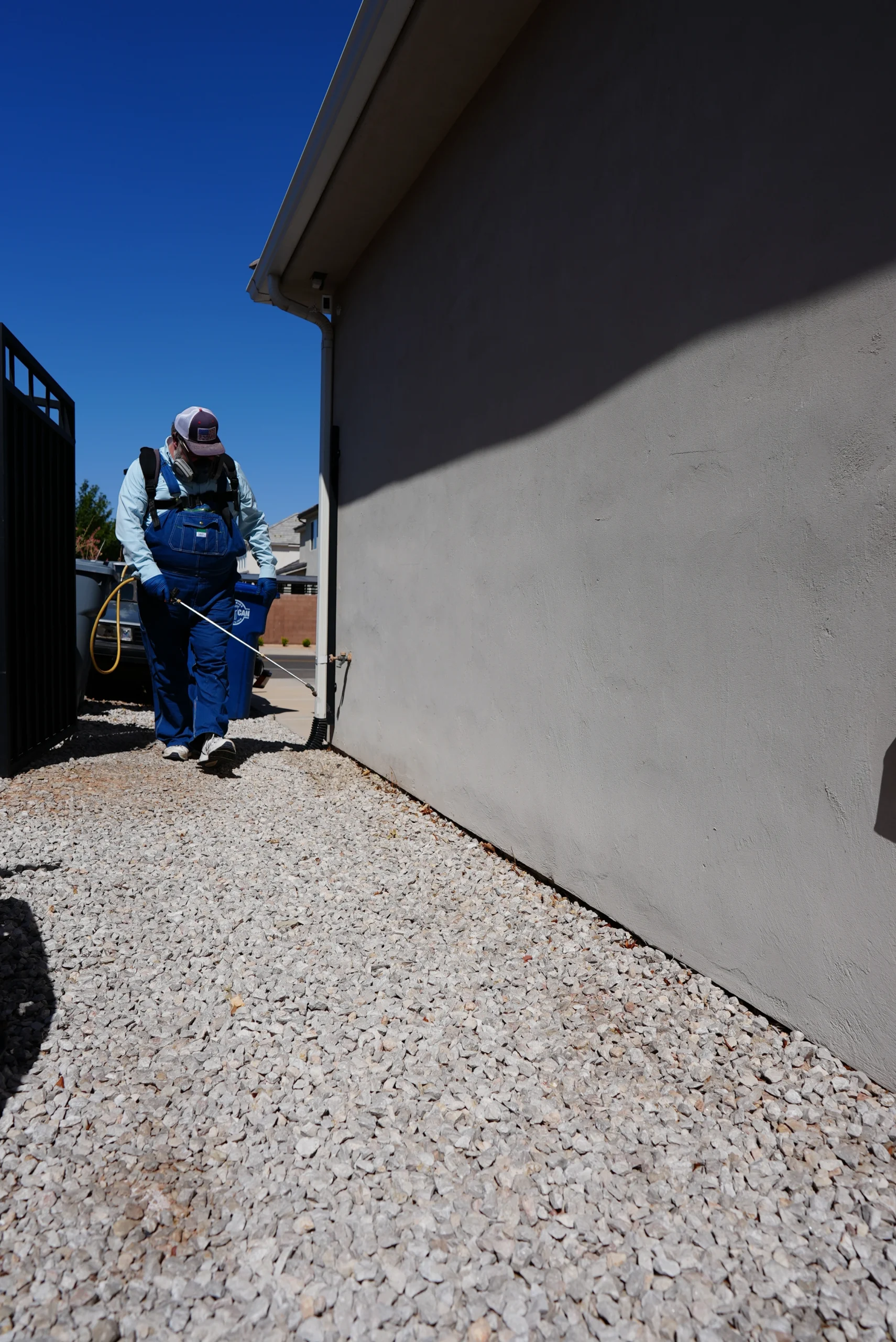 Best Overalls technician treating a home entryway in Southern Utah